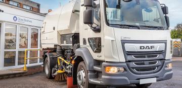Image shows a DAF sweeper vehicle in front of a Close Brothers Vehicle Hire Office